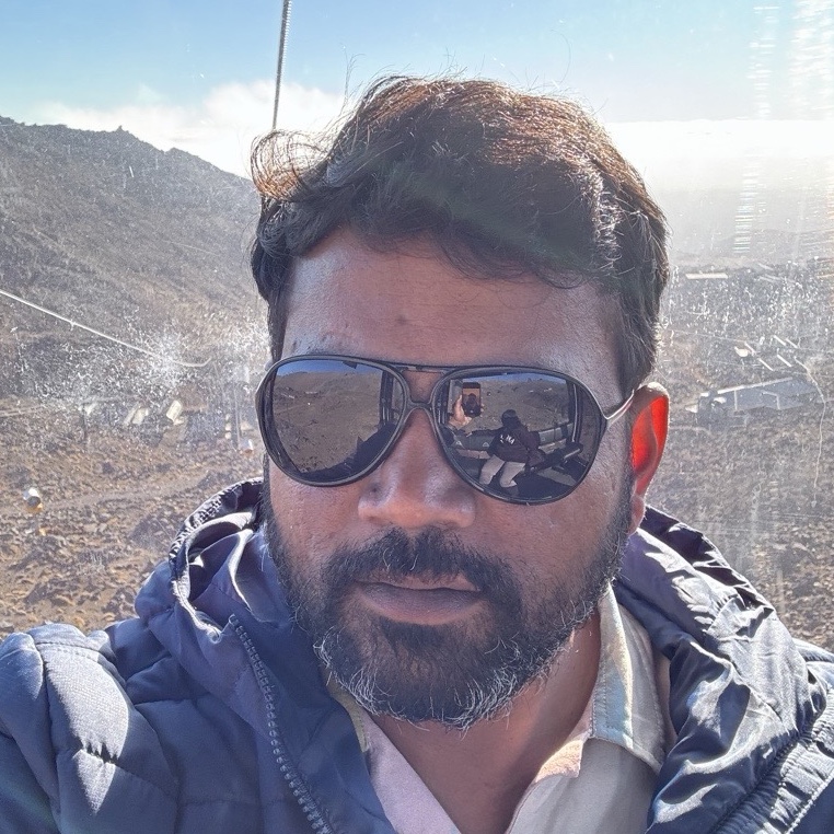 Charan M