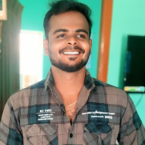 Dinesh T